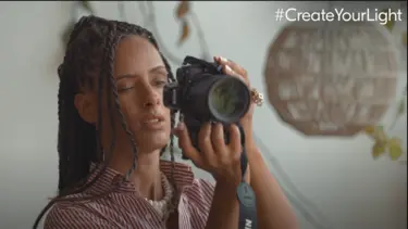 YouTube Thumbnail of Delphine Diallo using the Nikon Z 7II in her Create the Light video.